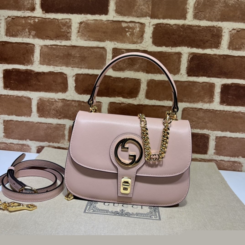 G*u*i top handle bags